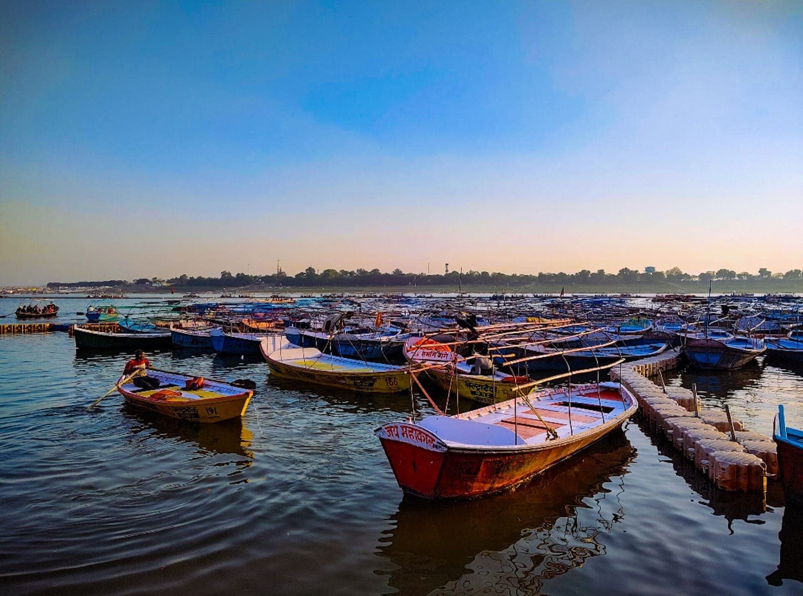 Rows of boats moored at the Triveni Sangam in Prayagraj